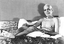 Bhagavan resting on the couch in the old hall